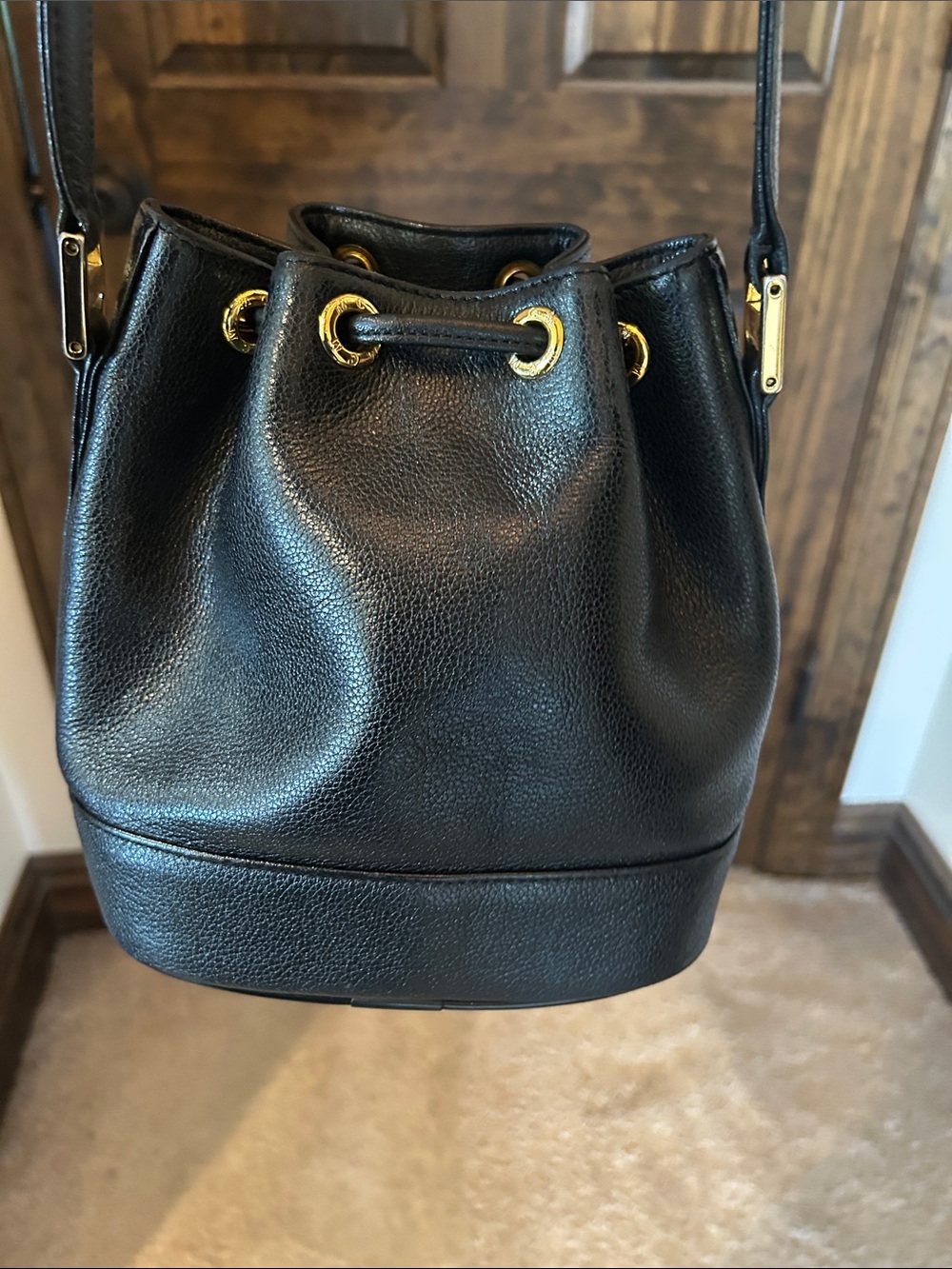 MCM Black Leather Mini Drawstring Bucket Bag with Gold Accents - Picture 8 of 14